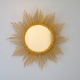 Miroir soleil vintage en rotin
